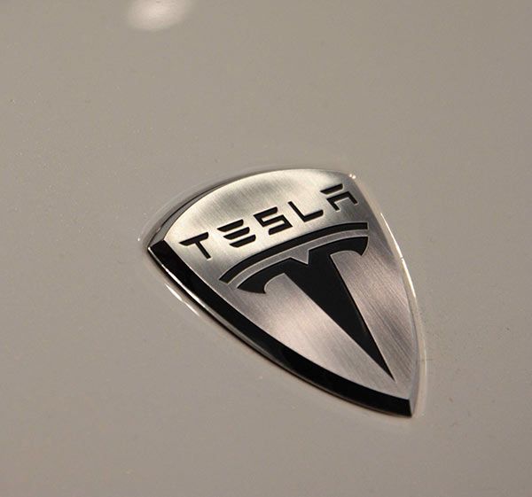 Tesla's logo in shield